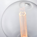 Endon 2.8W E27 LED globe bulb close-up showing the clear glass and etched acrylic sleeve diffuser with warm amber filament glow.