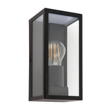 Endon Castwick box lantern wall light in matt black steel with clear bevelled glass panels and a single E27 filament bulb, on a white background.