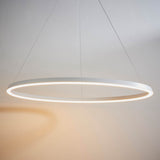 Endon Cliffton LED pendant in white, a slim 800mm ring suspended on fine wire cables with an illuminated diffuser, shown against a pale wall.