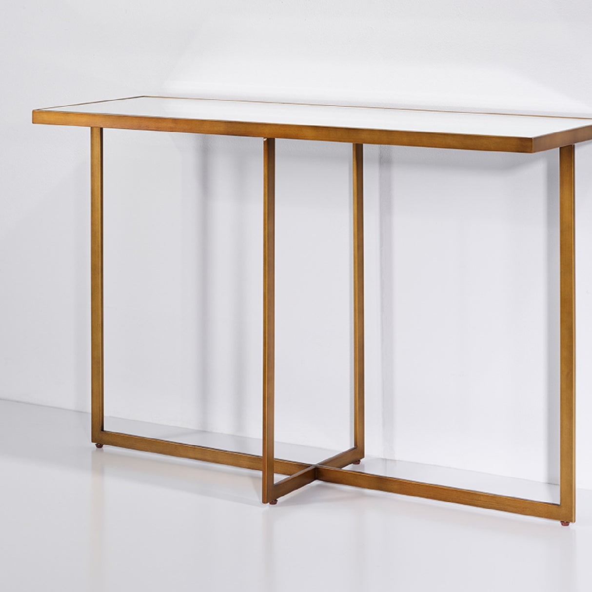 Tablo Bronze Mirrored Glass Console Table with a bronze metal frame, mirrored glass top, and crossing X-shaped legs, shown against a plain white background.