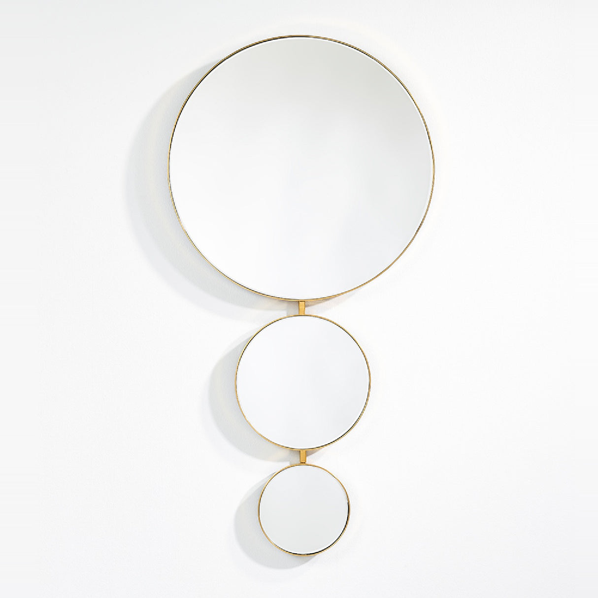 Opera Three Circle Gold Rimmed Wall Mirror 119cm, three connected circular mirrors in decreasing size with slim gold rims, arranged vertically on a plain white background.