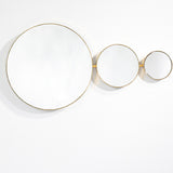 Opera Three Circle Gold Rimmed Wall Mirror 119cm shown in a horizontal arrangement of three joined round mirrors in decreasing size with thin gold frames, set against a plain white background.