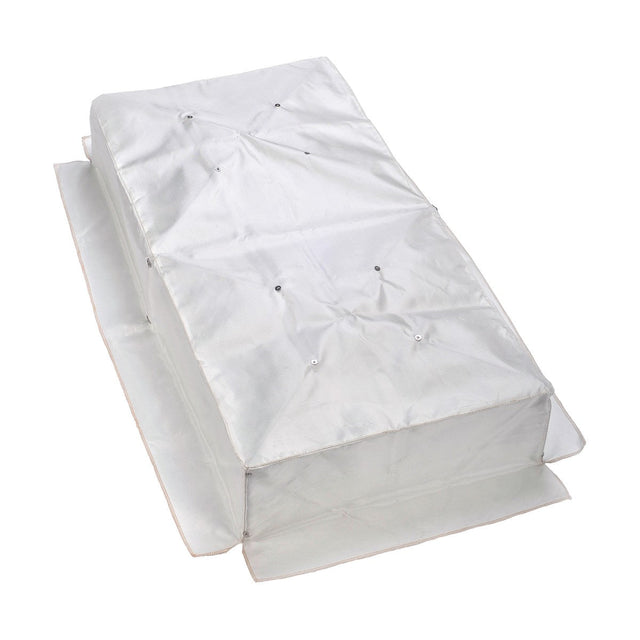 The Fire Hood, a collapsible structure covered in white fabric, features a rectangular shape and button details on top. Its side panels extend outward, providing a protective cover or tent designed with intumescent material for enhanced safety in case of fire.