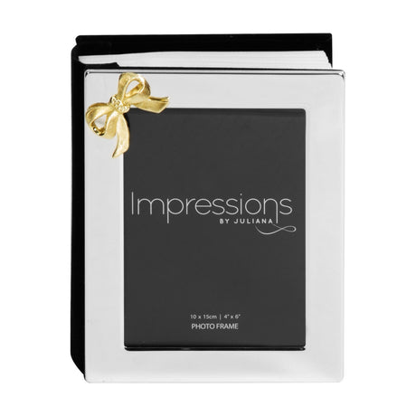 Silver metal photo album with a front frame cover and gold bow accent, holding a 4 x 6in portrait print and 100 pictures inside, shown on a plain white background.