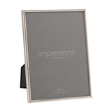 Rectangular photo frame with a thin silverplated metal edge, holding an 8 x 6in grey insert reading "Impressions Photo Frame", shown on a plain white background.
