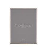 Rectangular photo frame with a thin silverplated metal edge, holding an 8 x 6in print, shown upright on a plain white background.