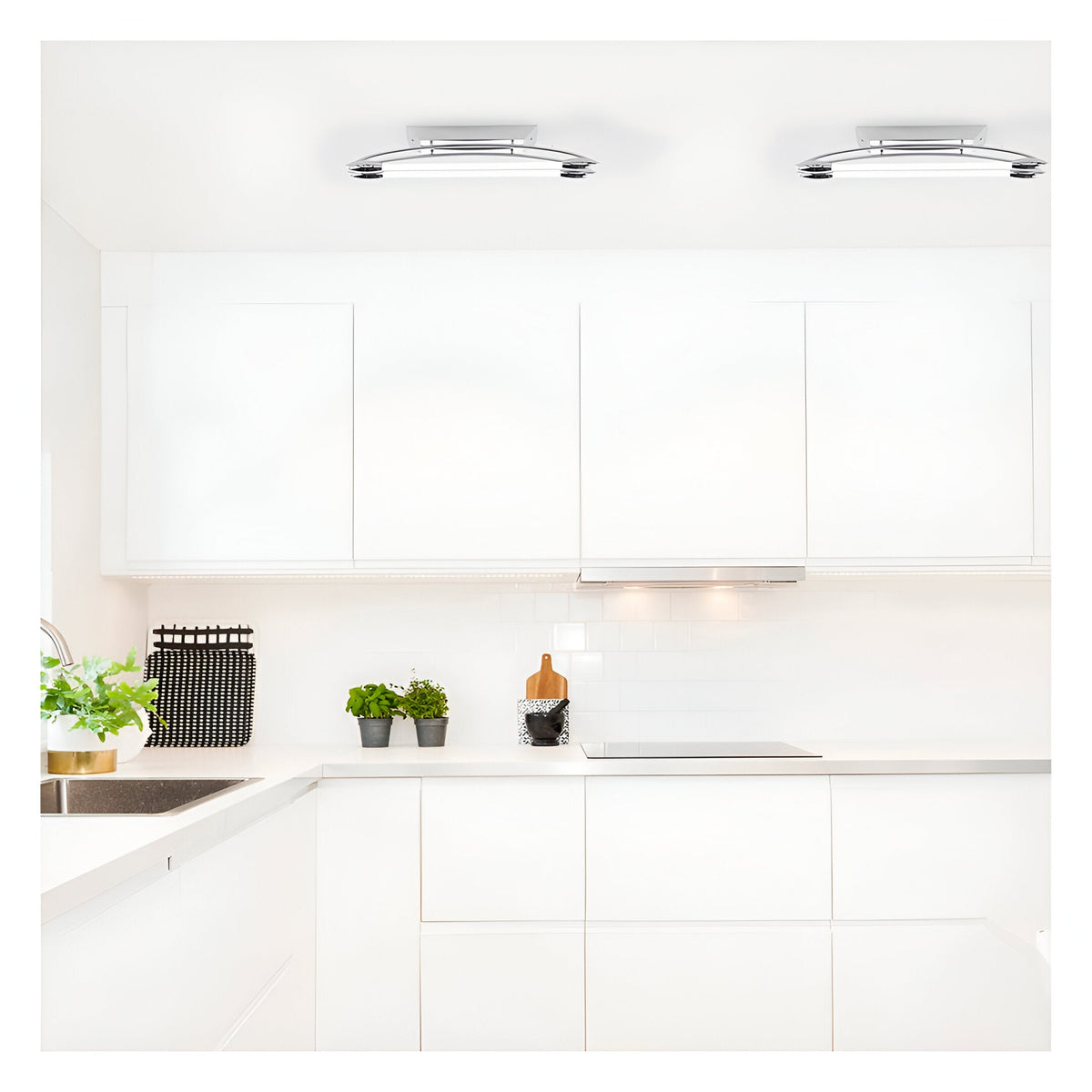 Brencombe 2 Light Small Linear Ceiling Light in polished chrome with white diffusers, mounted on a white kitchen ceiling above cabinetry.