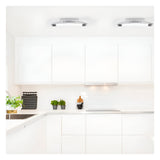 Brencombe 2 Light Small Linear Ceiling Light in polished chrome with white diffusers, mounted on a white kitchen ceiling above cabinetry.
