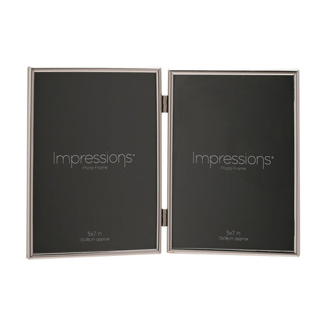 Hinged double photo frame in polished silver metal with two slim rectangular openings for 5x7in prints, shown upright on a plain white background.