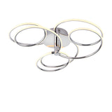 Endon Ravel LED semi-flush ceiling light in chrome, featuring four interlinked illuminated rings around a circular ceiling plate, on a white background.