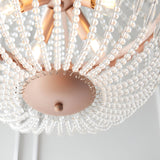 Close-up of the Bevdale 5 Light Pendant in gold, showing clear glass bead strands draped from the metal frame with visible bulbs and central mounting plate.