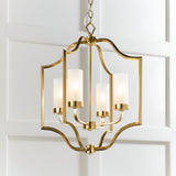 Endon Brackford 4 light pendant with satin brass shaped frame and frosted glass cylinder shades, suspended from a chain against a white panelled wall.