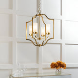 Endon Brackford 4 light pendant in satin brass with frosted glass cylinder shades, hung above a mirrored console with dried hydrangeas.