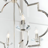 Close-up of the Bramfield 4 Light Pendant in polished nickel with candle bulbs, crystal glass bobeches, and a quatrefoil-shaped frame on a white background.