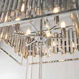 Aldbourne 6 Light Pendant in polished chrome, close-up of candle bulbs and central star fitting with bevelled glass crystal rods on a square frame.