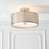 Endon Rosaline 3 light flush ceiling light in nickel with circular patterned metal drum shade and inner fabric diffuser, mounted on a panelled hallway ceiling.