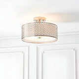 Endon Rosaline 3 light flush ceiling light in nickel with patterned circular drum shade and inner fabric diffuser, mounted on a white panelled ceiling.
