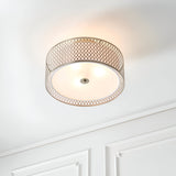 Endon Rosaline 3 light flush ceiling light in nickel, with a circular patterned metal drum shade and inner fabric diffuser, mounted on a white ceiling.