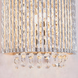 Close-up of illuminated Endon Isadora 2 light wall light showing twisted polished chrome rods and K9 clear crystal droplets along the base.