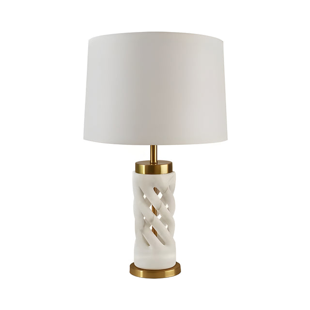 The Iverne 1 Light Twisted Carved Alabaster Table Lamp in brass and soft white features a twisted alabaster base, gold accents, and a large white fabric shade, shown against a plain white background.