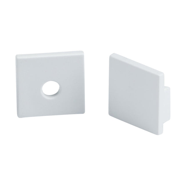 Two Aluminium Plaster In Profile End Caps in white, one with a central circular opening and the other solid, are showcased against a pristine white background.