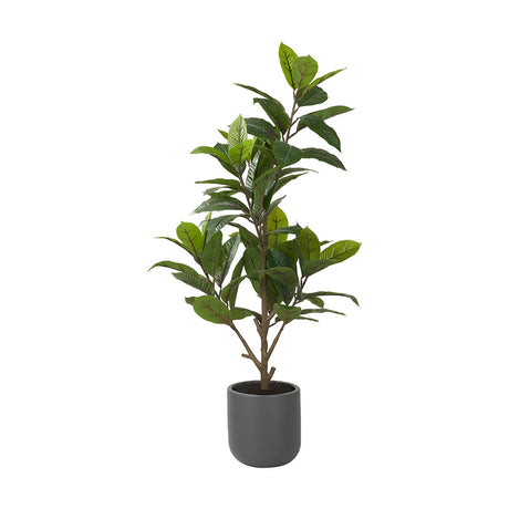 Artificial Magnolia Tree in Pot, 130cm tall with green foliage on a branching stem, set in a matte grey round planter against a plain white background.