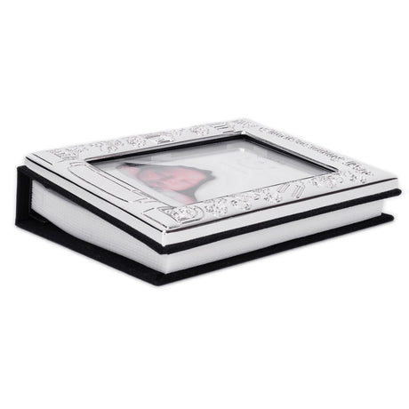 My Christening Day photo album with silverplated frame cover, embossed baby motifs, photo window, and black velvet base, shown on a white background.