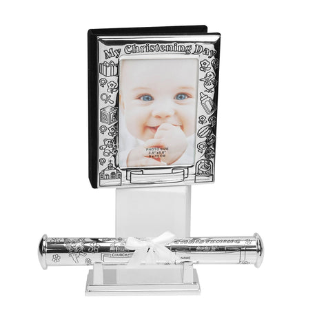 My Christening Day silver photo album with polished frame, baby motifs, and photo of a child, paired with a certificate holder on a white stand.