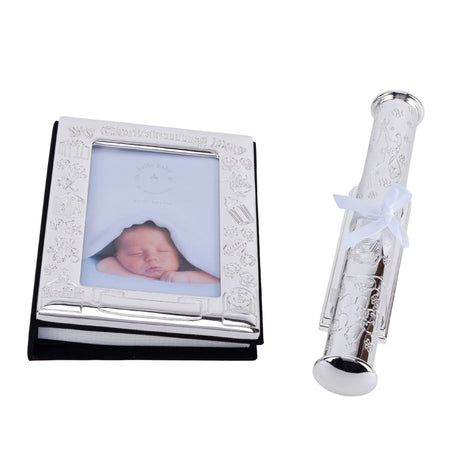 Silver-plated "My Christening Day" photo album with embossed baby motifs framing a sleeping infant photo, paired with a matching engraved certificate holder and stand, shown on a white background.