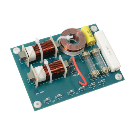 QTX X48R2KH 2-way speaker crossover board with copper inductors, yellow capacitor, ceramic resistor, and spade terminals on a green PCB.