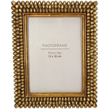 Libra Interiors Textured Beaded Gold Photo Frame with raised beaded resin border in radiant gold, holding a 13x18cm print, shown on a white background.