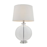 Endon Bramleigh table lamp with a clear glass ellipsoid base, polished nickel fittings and tapered white linen-mix shade on a plain background.