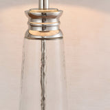 Close-up of the Endon Danehurst table lamp base, showing clear hammered glass with tiered bright nickel plated metalwork.