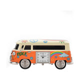 Miniature camper van mantel clock in orange with cream roof, analogue clock face on the side, painted with PEACE lettering, rainbows, flowers and a peace symbol, on a plain white background.
