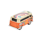 Miniature camper van mantel clock in orange metal with cream roof, painted with PEACE, LOVE, rainbows, flowers and peace symbols, analogue clock face on the side, shown on a white background.