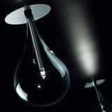 Yarvelle Glass Downlight in chrome, a clear teardrop glass shade with a central chrome rod and G4 bulb, mounted on a flush chrome ceiling plate against a dark background.