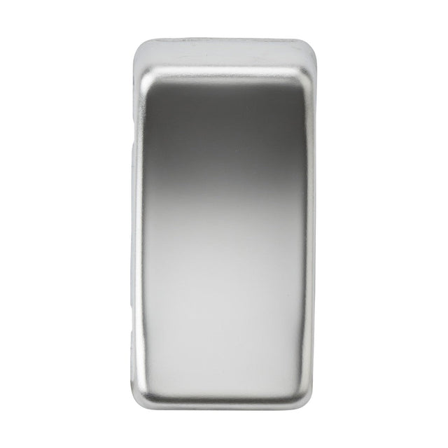 The Switch Cover - Polished Chrome, featuring a rectangular shape and rounded edges, is displayed against a white backdrop.