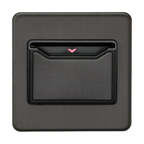 A smoked bronze, square-shaped electronic device with a slightly recessed center panel and a small red arrow at the top. The screwless design is sleek and modern, featuring clean lines and a matte finish, making it ideal for key card activation in hotel room power switches.