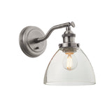 Wentworth Wall Light in silver, an industrial-style fixture with adjustable knuckle arm, knurled lamp holder and clear domed glass shade.