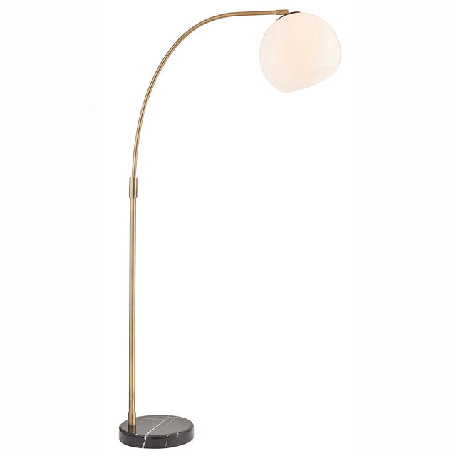 Sinclair floor lamp with a curved brass stem, round white glass globe shade, and black marble base on a plain white background.