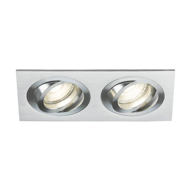 The Ambar Twin Tilt Square Downlight in brushed chrome is a rectangular recessed ceiling light fixture featuring two circular adjustable spotlights, making it an ideal addition to architectural lighting. This piece brings sophistication and versatility to any modern interior.