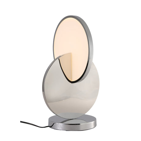 The Half Moon LED Table Lamp - Silver features a modern oval light partially encased in a shiny chrome-finished curved plate, with a circular metallic base and body, minimalist design, and black power cord extending from the base.