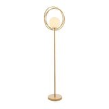 Endon Brackshaw floor lamp in brushed gold with an opal glass globe held within three interlinking rings on a slim stem and round base.