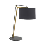 Endon Carlfield cantilevered table lamp with matt brass arm, black cotton drum shade, and matt black round base on a plain background.