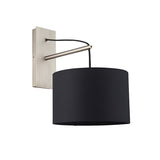 Carlfield Wall Light in Nickel, a cantilevered design with a matt nickel stem, black base, and black fabric drum shade, shown on a plain white background.