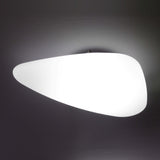 Stone LED Flush Ceiling Light in white, pebble-shaped diffuser glowing softly, mounted flush against a dark background.