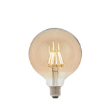 Endon 6W E27 LED filament globe bulb with amber tinted 125mm glass and visible warm white filaments above a screw cap, on a plain white background.