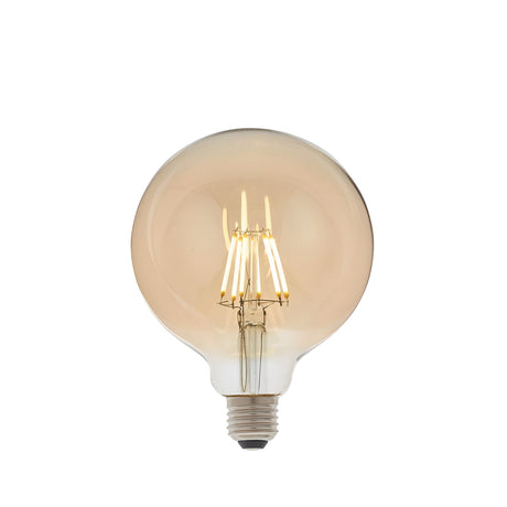 Endon 6W E27 LED filament globe bulb with amber tinted 125mm glass and visible warm white filaments above a screw cap, on a plain white background.