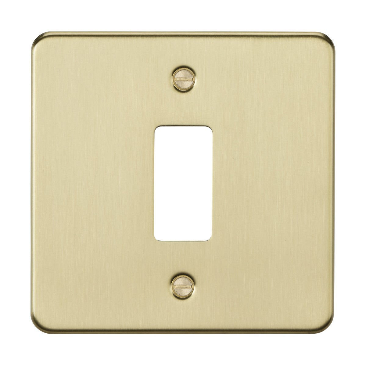 The 1 Gang Grid Faceplate - Brushed Brass boasts a premium grade steel flat plate with a brushed brass finish and a rectangular opening for the switch toggle. Visible screws at the top and bottom provide secure mounting.