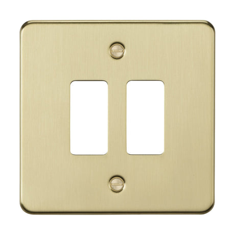 Introducing the 2 Gang Grid Faceplate in Brushed Brass, crafted from premium grade steel. This elegant double light switch plate features two rectangular switch openings and a classic design with two visible screws.